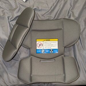 Dark grey and light grey infant inserts for Nuna car seat